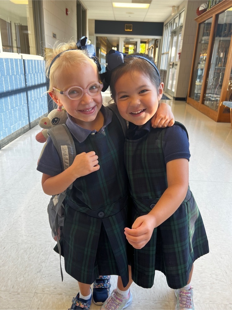 two girls in school uniforms