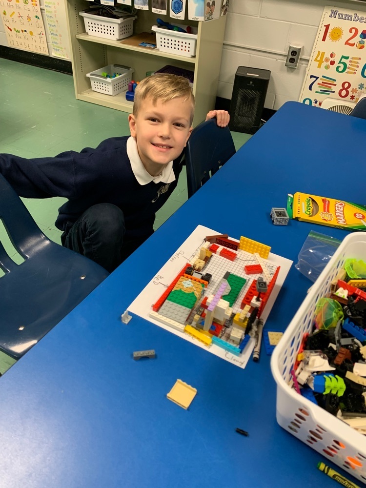 This third grader designed and built his room to scale using Lego blueprint paper and legos!